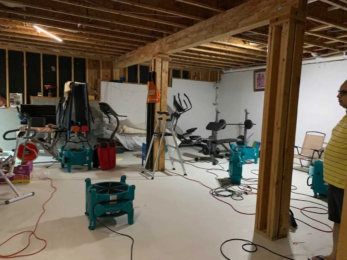 Basement drying equipment setup for Contents Cleaning & Restoration in Tahlequah